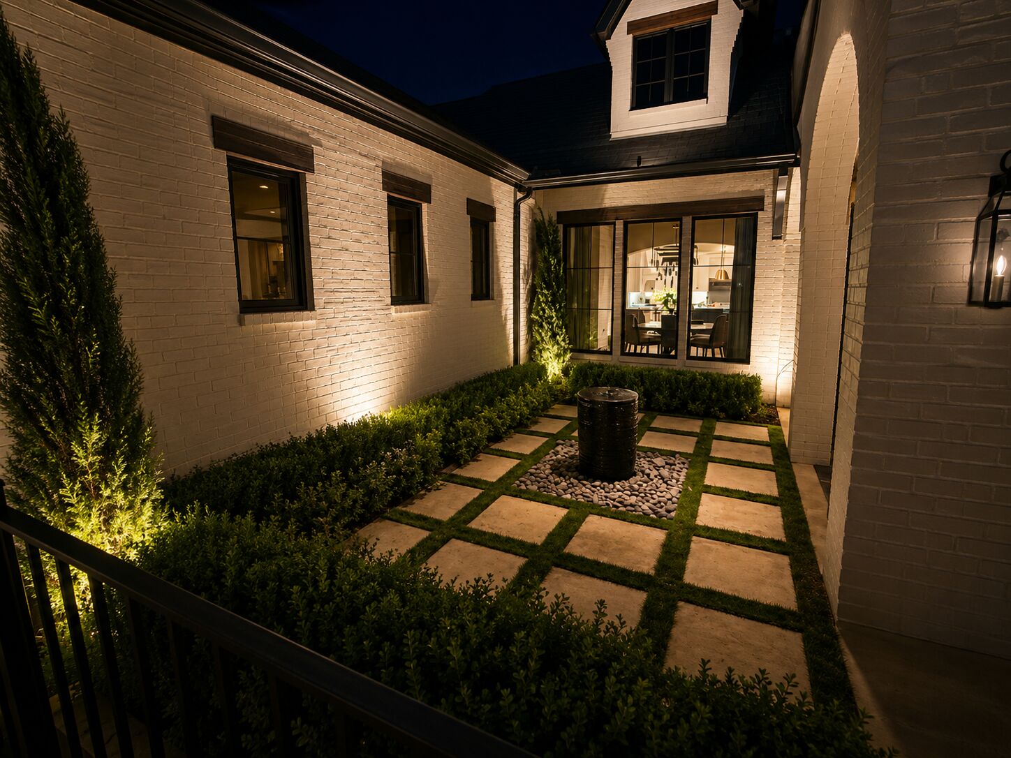 Architectural uplighting on home exterior columns
