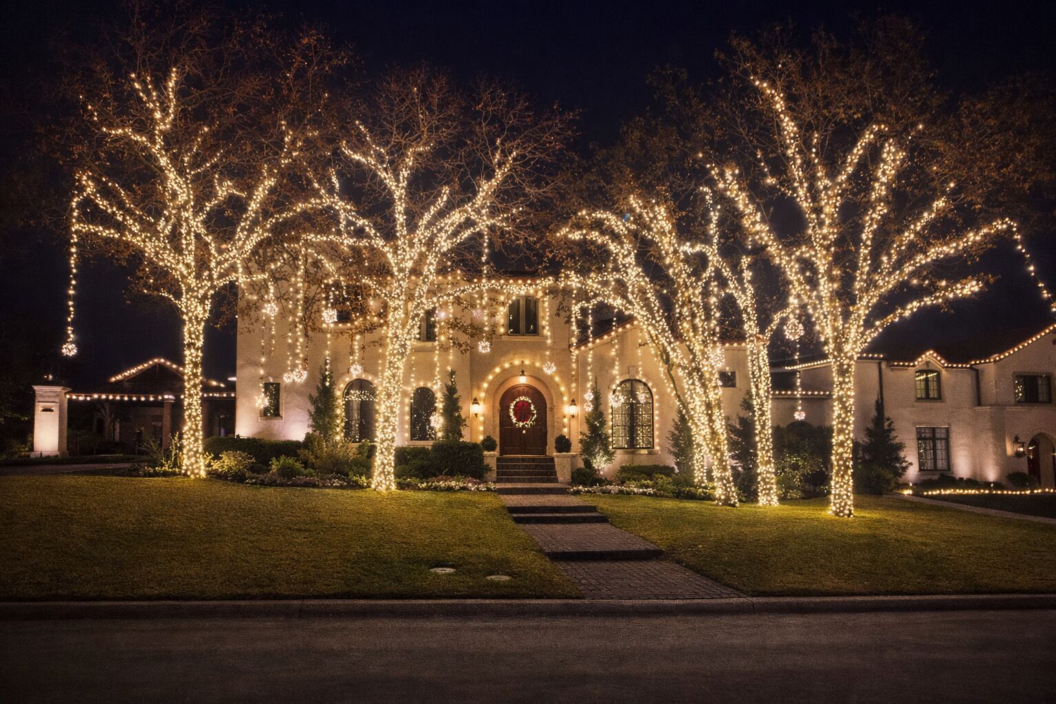 Complete outdoor lighting package transforming home curb appeal